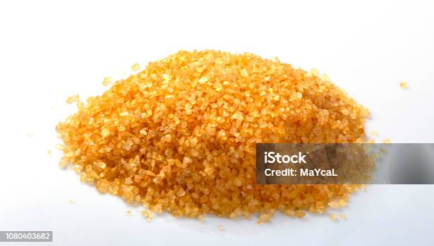 Pile Of Orange Himalayan Salt On White Background Stock Photo - Download Image Now - Aromatherapy, Asia, Backgrounds