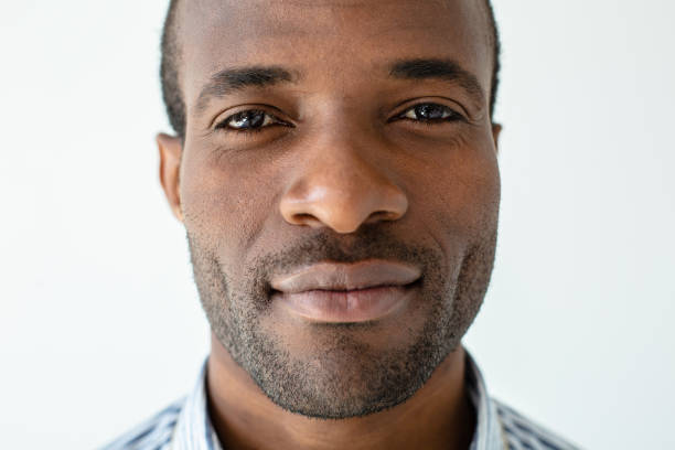 istock Handsome afro american man standing against white background 1080411902