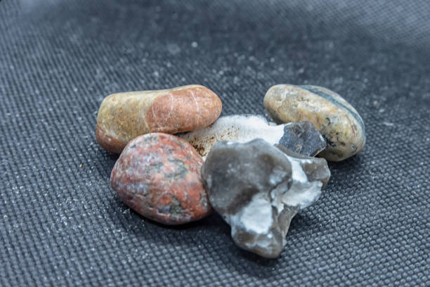 istock Stones from the Baltic Sea on black background 1080412616