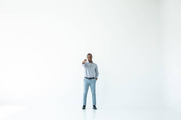 istock Positive afro american man pointing you 1080412676