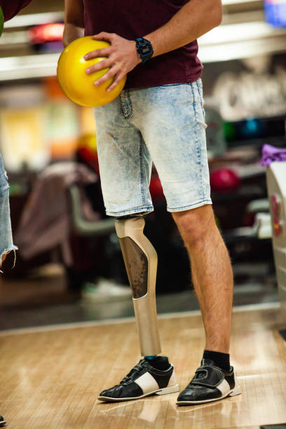 istock Man with prosthetic leg bowling 1080419722