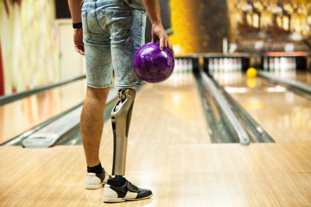istock Man preparing to throw bowling ball 1080423236