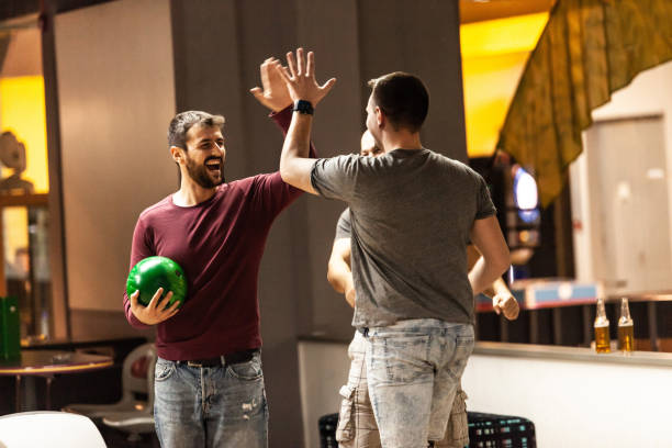 2,700+ Group Of People Bowling Stock Photos, Pictures & Royalty-Free