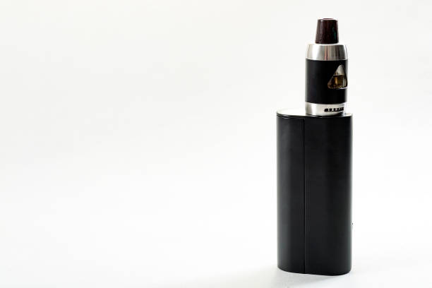 istock Vaping device and electronic cigarette concept with a vaporizer isolated on white with a clipping path included and copyspace 1080427530