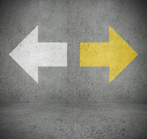 istock White and yellow arrow on wall, choice 1080427544