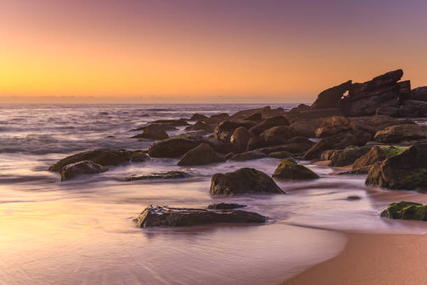istock Rocky Sunrise Seascape 1080427666