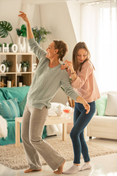 istock Mother and daughter enjoying a dance 1080427704