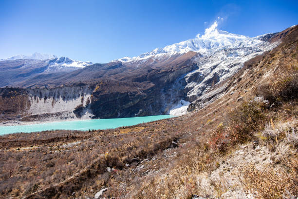 View of Birendra Lake under Manaslu glacier stock photo