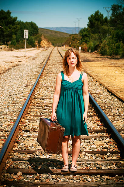 istock Young woman in a railway 108043540