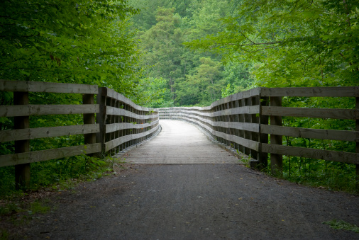 A wooden bridge on the Virginia Creeper Trail, a 34.3-mile rail-to-recreation trail, traversing thru Abingdon and Damascus, and ending in Mount Rogers.