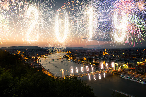Celebrating new year in Budapest, Hungary, the danube river, and fireworks show, part of series of concept travel images