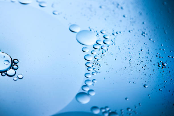 istock Oil water macro bubbles abstract background 1080445874