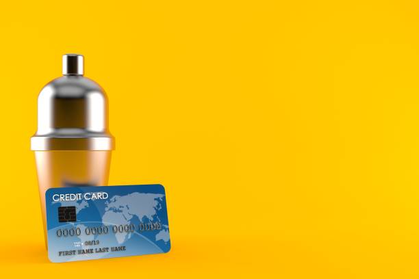 istock Cocktail shaker with credit card 1080449948