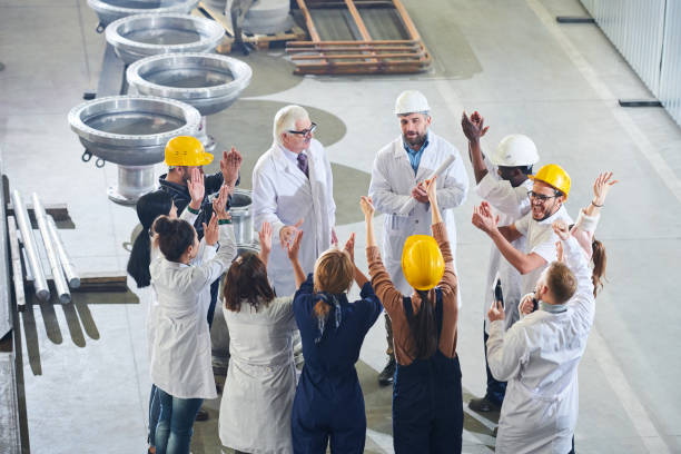 istock Group of Happy Factory Workers 1080450590