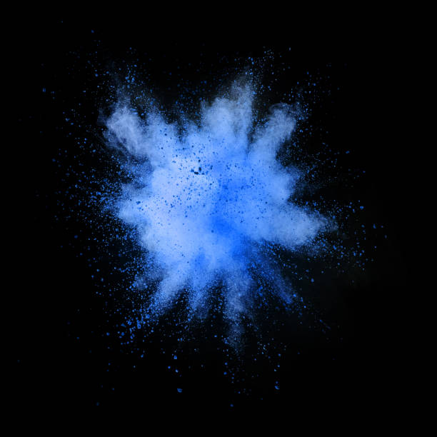 istock Explosion of blue powder on black background 1080453316