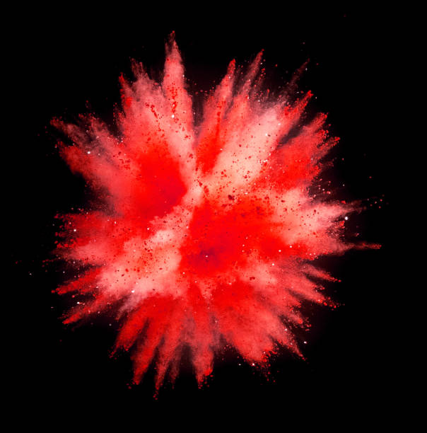 istock Explosion of red powder on black background 1080453558