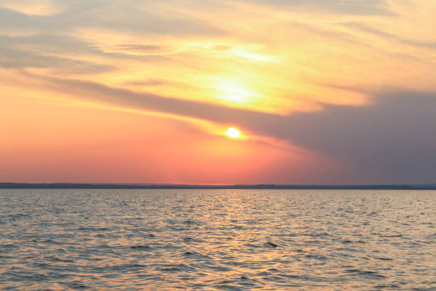 Sunset on the beach stock photo