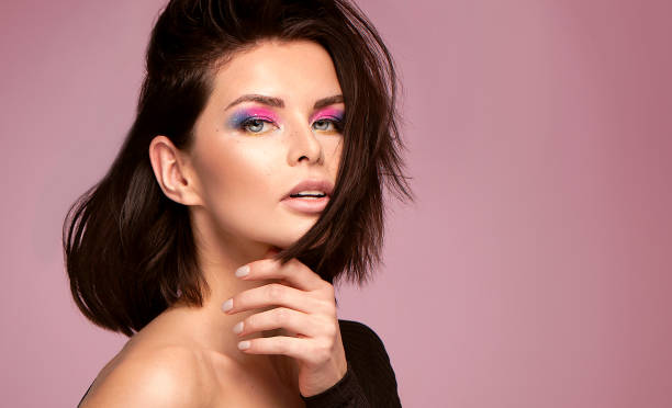 istock Sensual woman with colorful makeup. 1080491012