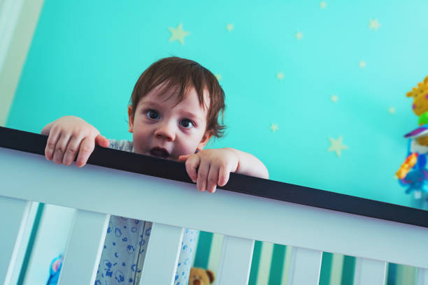 istock Baby Boy in Crib 1080494300