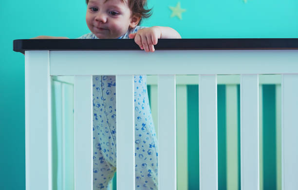 istock Baby Boy in Crib 1080494424