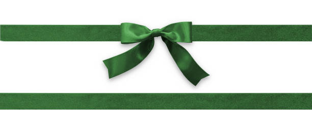 Green bow ribbon band satin emerald stripe fabric (isolated on white background with clipping path) for Christmas holiday gift box, greeting card banner, present wrap design decoration ornament Green bow ribbon band satin emerald stripe fabric (isolated on white background with clipping path) for Christmas holiday gift box, greeting card banner, present wrap design decoration ornament lace fastener photos stock pictures, royalty-free photos & images