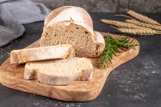 istock Fresh fragrant bread on the table. Food concept. 1080499776