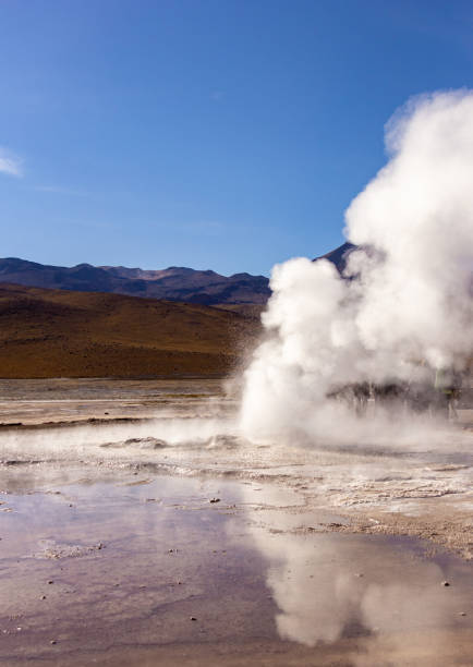 istock People warming up near a Geiser at Atacama desert. 1080518806