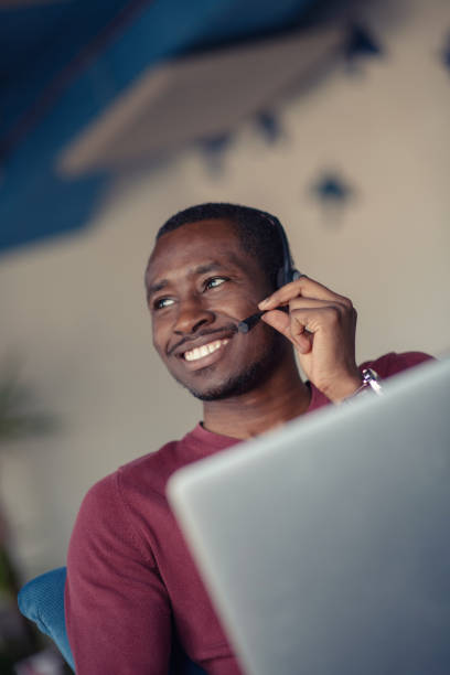 istock Emotional dark skinned male freelancer celebrating completed project successfully. 1080519298