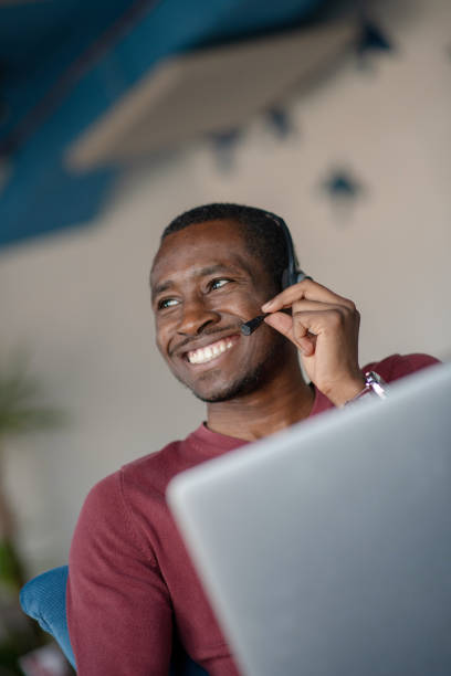 istock Emotional dark skinned male freelancer celebrating completed project successfully. 1080519484