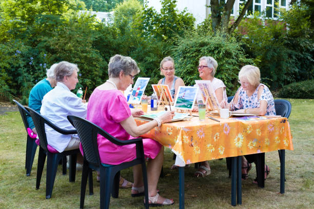 istock Senior ladies attending art classes outdoors. 1080547438