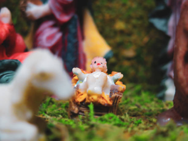 Colorful snowman figurines and various handcrafted decorations are displayed at a lively holiday market, creating a cheerful winter atmosphere for shoppers.