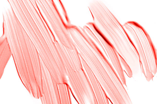 Red and pink painted acrylic heart isolated on white 