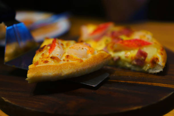 istock Tasty sliced pizza close up 1080570408