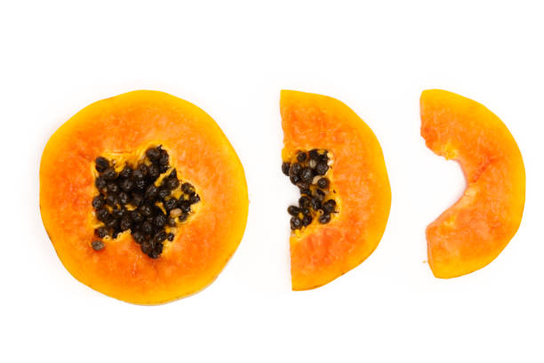 istock ripe slice papaya isolated on a white background. Top view. Flat lay 1080590052