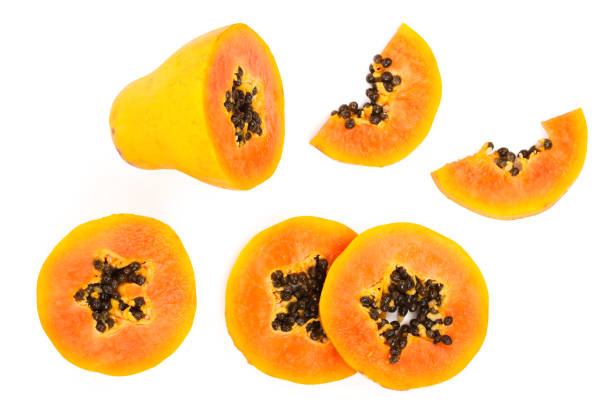 istock ripe papaya and slice isolated on a white background. Top view. Flat lay 1080590104