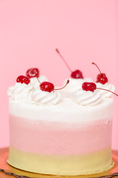 istock Birthday Spumoni cake on pink background. 1080590282