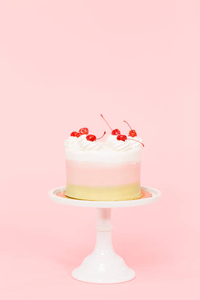 istock Birthday Spumoni cake on pink background. 1080590288
