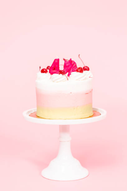 istock Birthday Spumoni cake on pink background. 1080590596