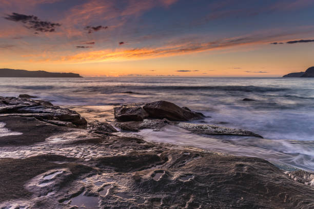 istock Sunrise Seascape with Streaky Clouds 1080591446