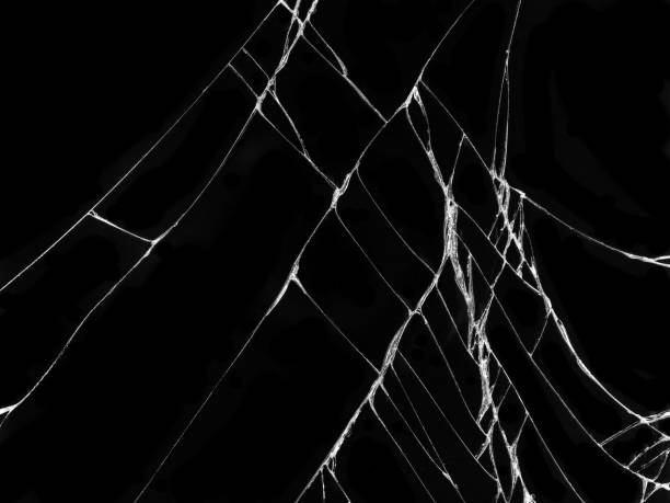 istock Cracked glass texture on black background 1080595586