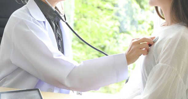 istock Doctor using stethoscope for examining patient  in his office at Hospitals 1080604790