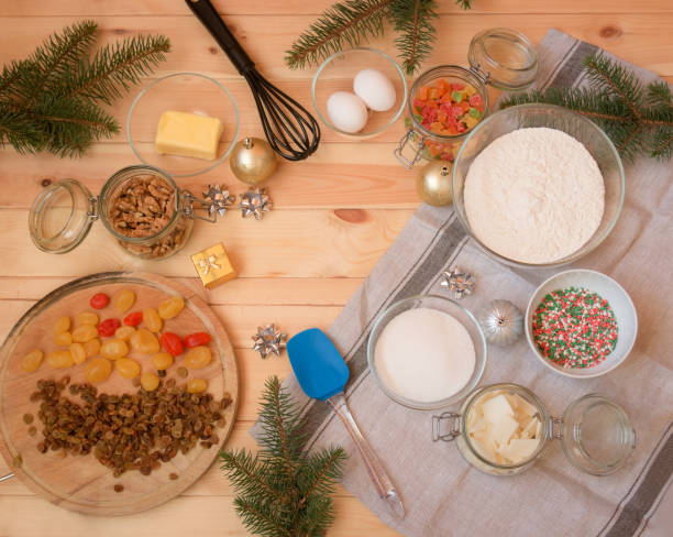 istock Baking ingredients for christmas cake, christmas decorations, fir branches, whisk and spatula 1080608464