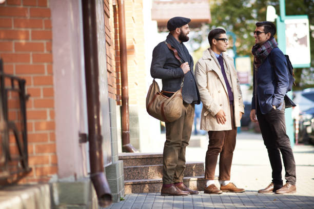 istock Stylish Men Chatting Outdoors 1080634970