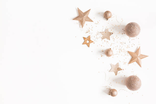 istock Christmas composition. Christmas golden decorations on white background. Flat lay, top view, copy space 1080639534