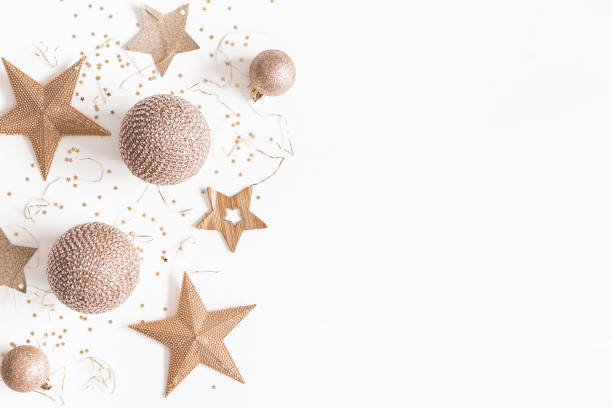 istock Christmas composition. Christmas golden decorations on white background. Flat lay, top view, copy space 1080641838