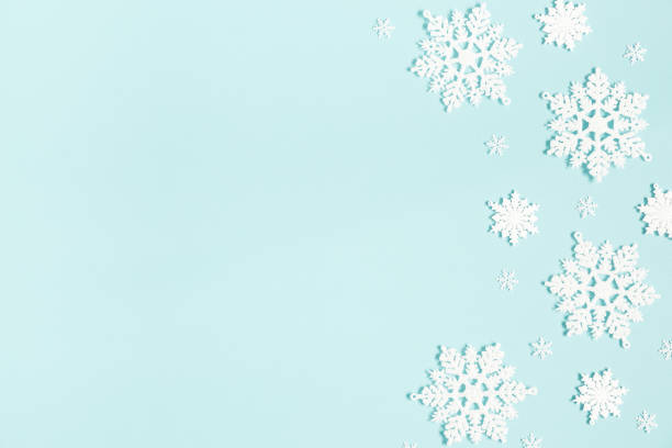 istock Christmas or winter composition. Pattern made of snowflakes on pastel blue background. Christmas, winter, new year concept. Flat lay, top view, copy space 1080643124