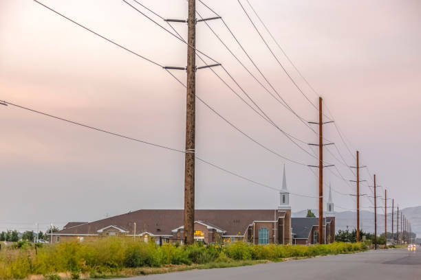 istock Power lines along the road in Eagle Mountain Utah 1080652254