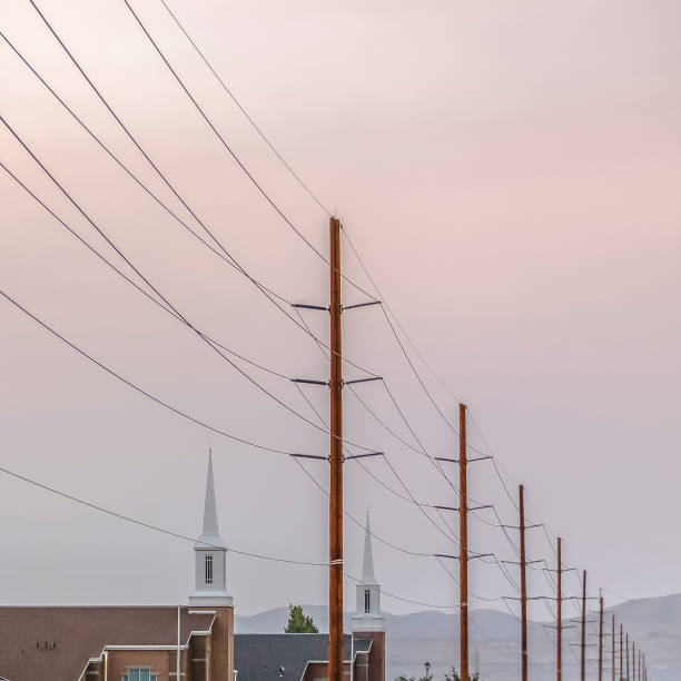istock Row of electricity posts in Eagle Mountain Utah 1080652270