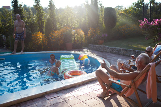 istock Social Seniors Pool Fun 1080653024