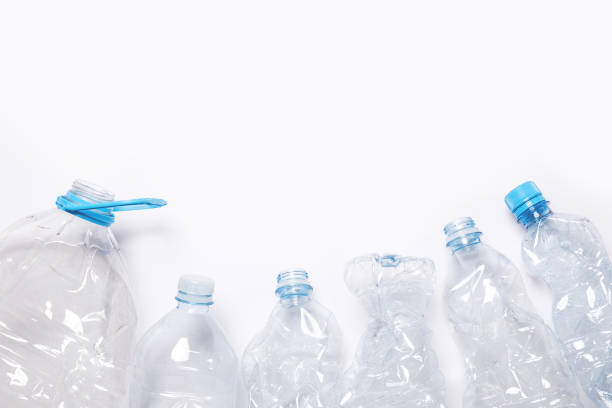 istock Concepts of pollution and recycling. Different used plastic bottles 1080653506